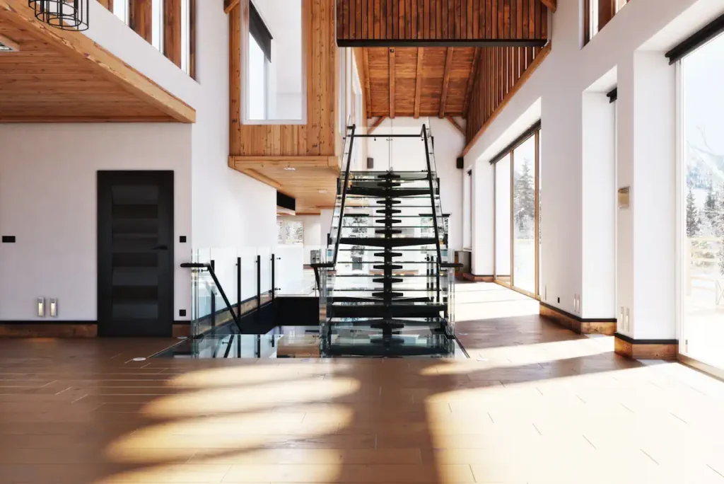 Un escalier transparent dans une maison